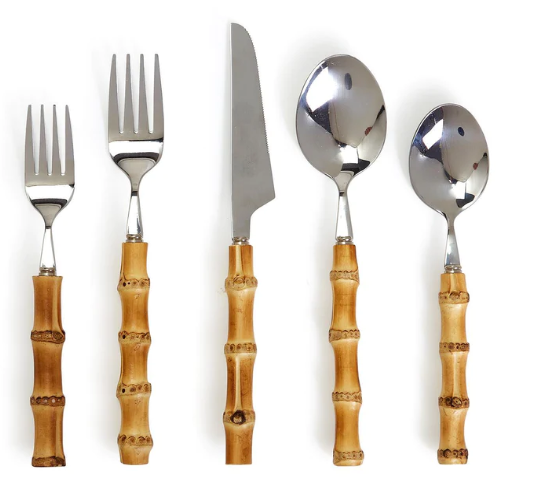 Bamboo-handled fork and knife with elegant styling.
