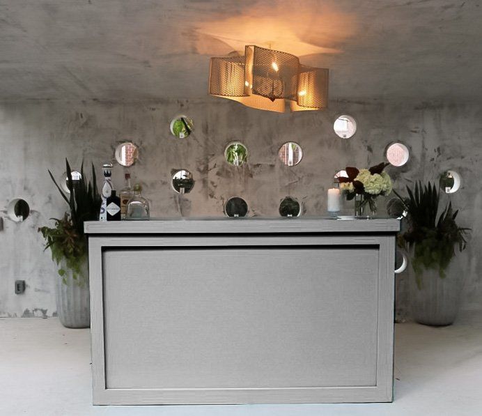 Oyster gray bar setup with clean lines.